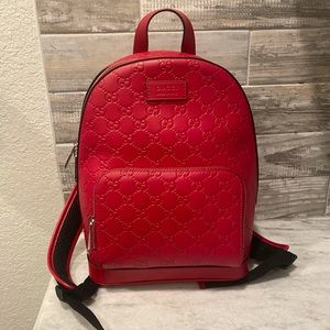 red gucci backpack